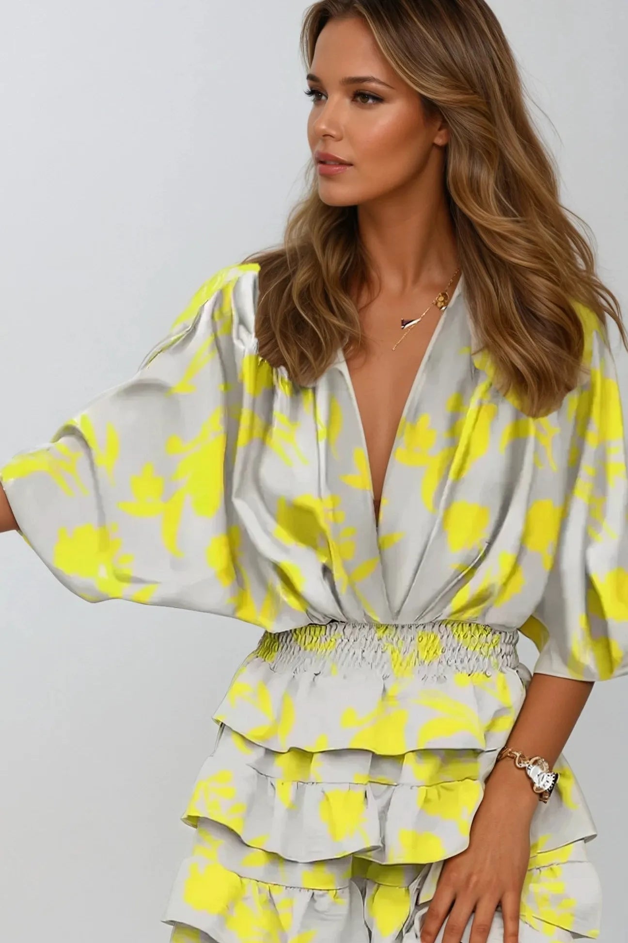 Mini-robe à volants et à volants